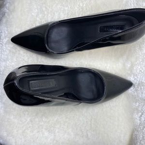 Black stiletto heels size 7.5